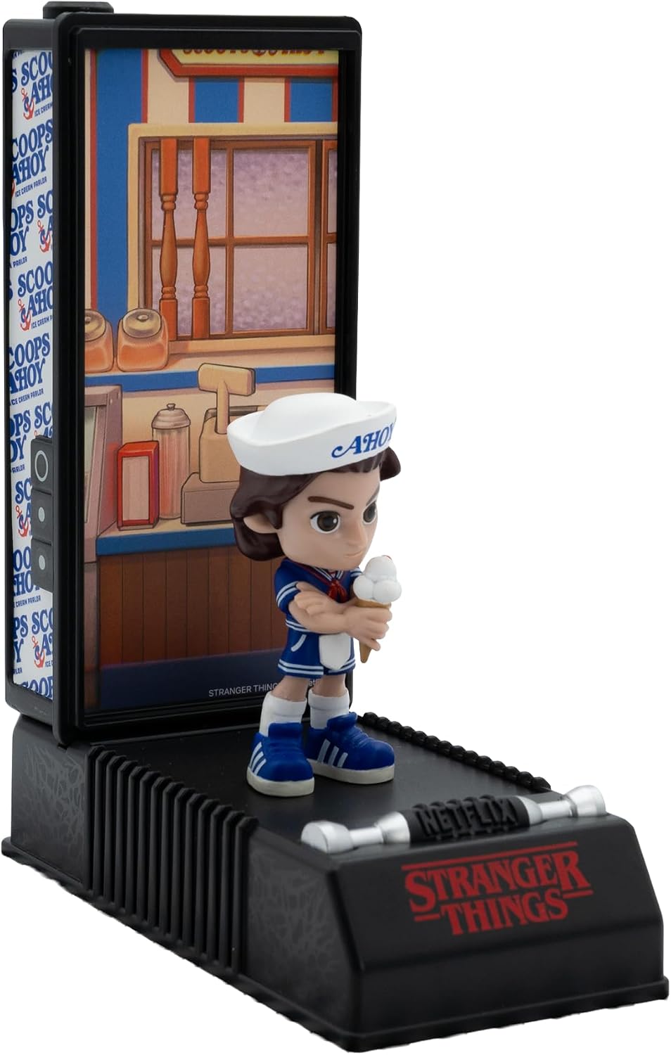 Figura sorpresa Stranger Things en cápsula con forma de Walkie Talkie 16x7,6x6,4cm