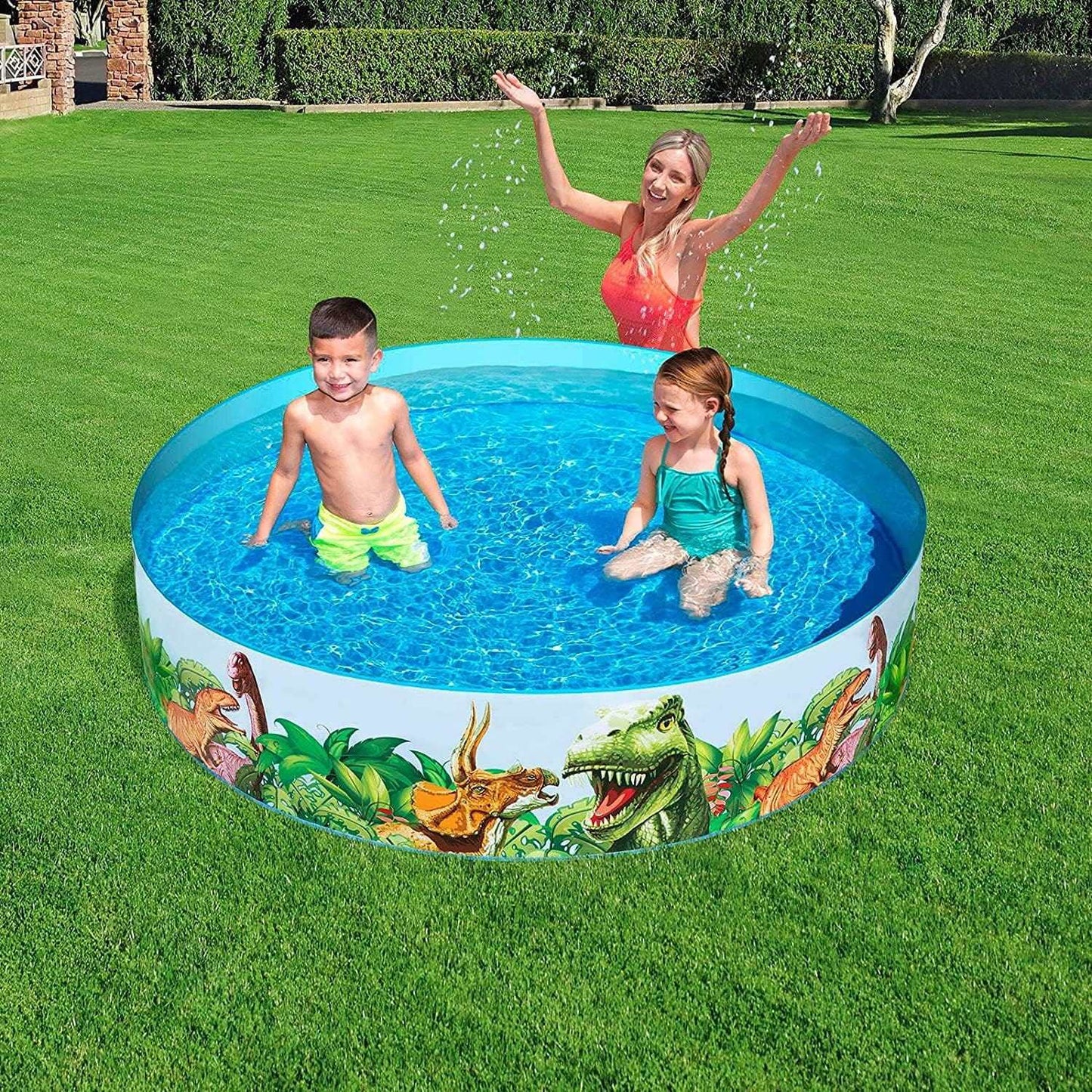 piscina infantil redonda decorada con dinosaurios para niños