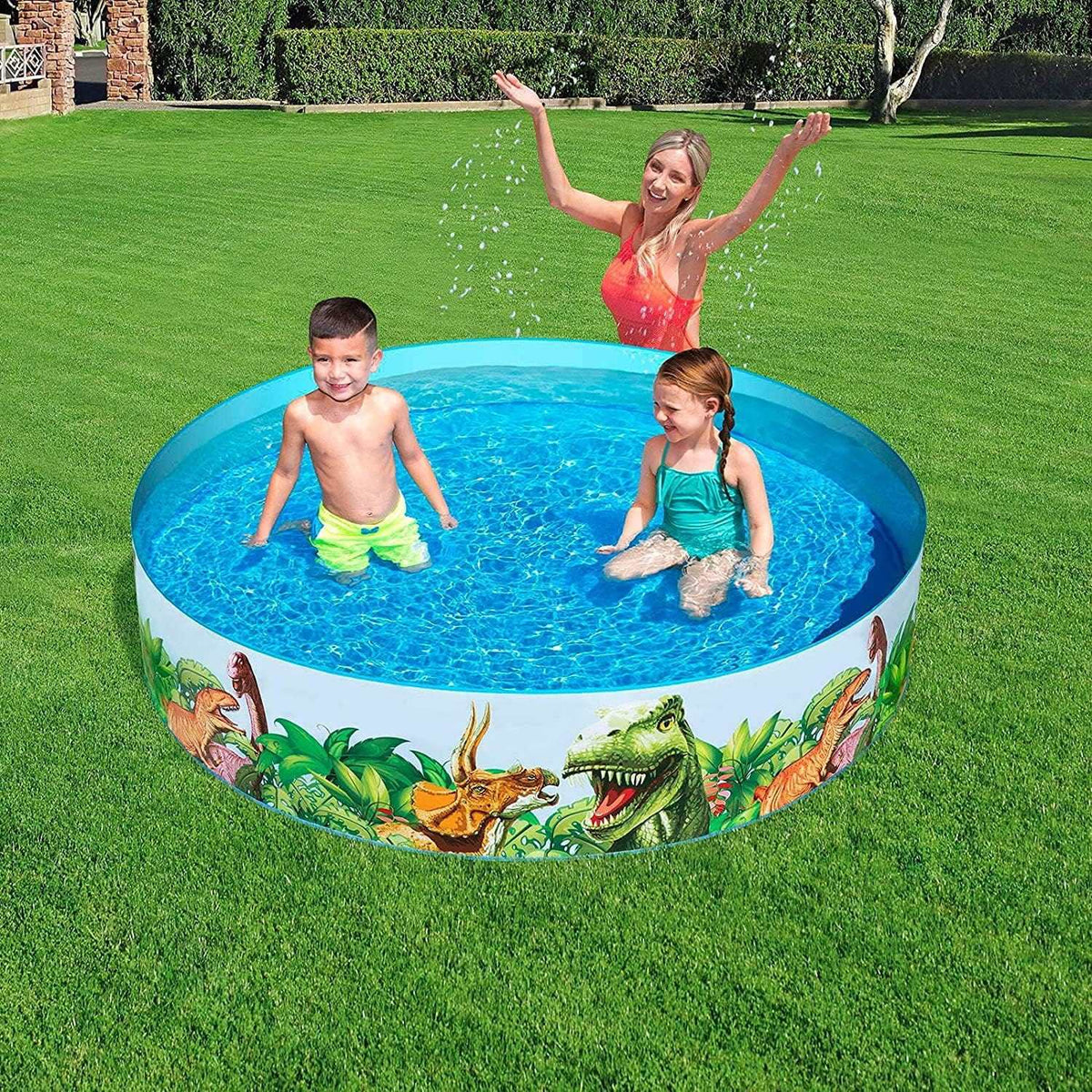 piscina infantil redonda decorada con dinosaurios para niños
